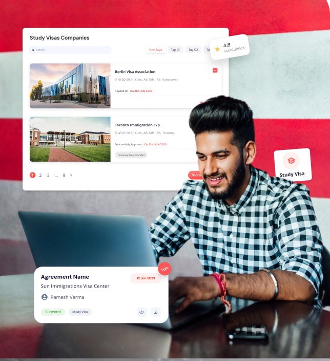 Smiling man typing on laptop, with two study visa company listings visible in background.